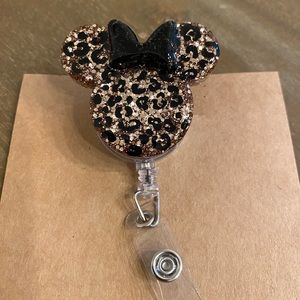 Leopard badge reel